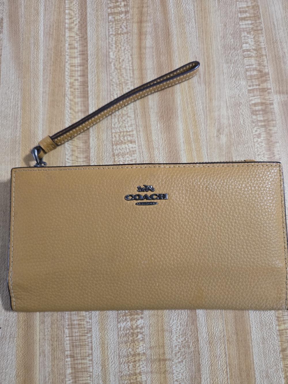 Coach Pebbled Leather Wristlet in Mustard Yellow with Gunmetal Logo